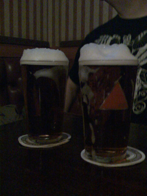 11/12/2008 - post-gig, well-earned pints with MASSIVE HEADS!