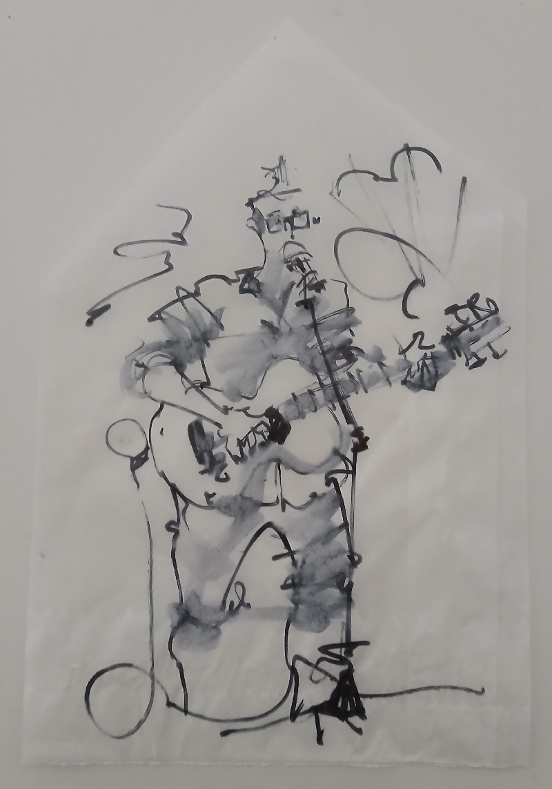 A sort of watercolour in black and white of me playing guitar